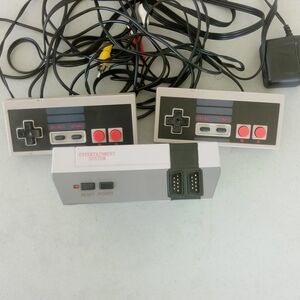 Gray and Black Entertainment System Console with Dual Controllers